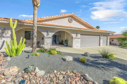 Photo of 9710 Troon Court, Desert Hot Springs, CA 92240 (MLS # IG26194258)
