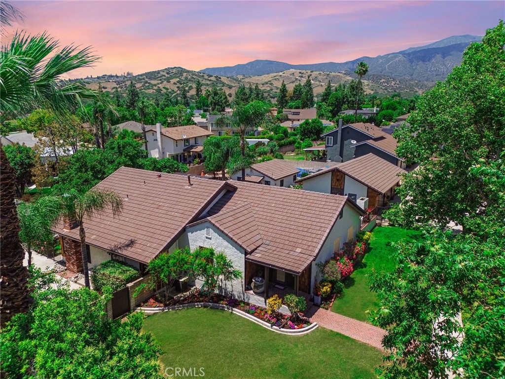 The Grove Home Estate
Where Claremont Heritage Meets Modern Luxury.
Nestled on a flat estate sized, fully usable land across three lots, The eagle Grove Home is a rare, multi-generational estate that blends historic charm with modern, resort-style living. Originally a 1930s citrus grove homestead, this fully renovated property features two upgraded homes, tranquil fountains, and expansive outdoor entertaining areas.
Residence Highlights
5 bedrooms, 3 full baths, including two primary suites with en-suite baths and walk-in closets
Fourth bedroom features a stunning brick fireplace—ideal as a study, guest room, or media lounge
Chef’s kitchen with Thermador appliances, Sausalito tile, artisan backsplash, and custom KraftMaid cabinetry
Historic character throughout: exposed beams, arched passageways, hardwood floors
California basement and naturally cool walk-in pantry
Renovated bathrooms with premium finishes
New cedar siding, interior/exterior paint, refinished floors, and new carpet
Marvin windows, wood blinds, designer lighting, and EV-ready 220V outlet
Guest House (ADU)
Detached 1-bedroom unit with full kitchen, living room, HVAC, and separate entry
with a separate electric meter—ideal for in-laws or income property.
Outdoor Living
Designed for seamless indoor-outdoor enjoyment with three entertainment zones:
Historic fireplace courtyard—once used by Boy Scouts and grove workers for over 100 years.
Shaded dining patio beneath mature fig and avocado trees.
Resort-style pool area with pergola, lounge seating (included), and built-in charcoal BBQ.
Rose garden, heirloom landscaping, vintage smudge pots, and raised garden beds.
Functioning citrus orchard with lemons, oranges, apricots, figs, and more.
Playground, fountains, and peaceful garden spaces for family and relaxation.
Additional Features
Oversized 3-car garage with vintage darkroom and generous storage
Garage laundry to maximize interior living space
RV parking with water and waste hookups
Custom kennel and multiple storage structures
Potential for future development or expanded multi-generational use.