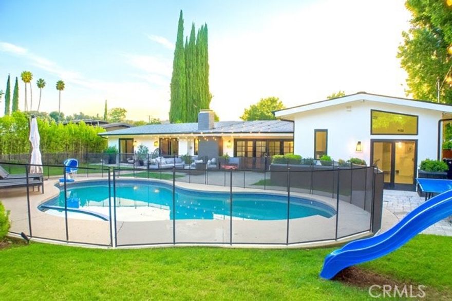 Stunning Mid Century modern designed by Charles Du Bois!  This gorgeous 4 bedroom POOL home is remodeled to the 10’s w/ a contemporary design! Original bright open floorplan w/vaulted ceilings and center island gourmet kitchen featuring white shaker cabinets, quartz countertops, top of the line appliances and 6 burner cooktop with high CFM designer hood. This chefs dream kitchen opens to the spacious living room and the large family room w/ sliders allow easy access to the perfect private backyard with lush landscaping, sparkling pool / spa and multiple patios to accommodate entertaining and outdoor dining! Large circular driveway with 2 car garage and tons of built-ins for storage! Amazing neighborhood in prime location south of the Blvd adjacent to Calabasas close to Bristol Farms, Starbucks, Farmers Market, Commons of Calabasas, The Village and award winning school district!