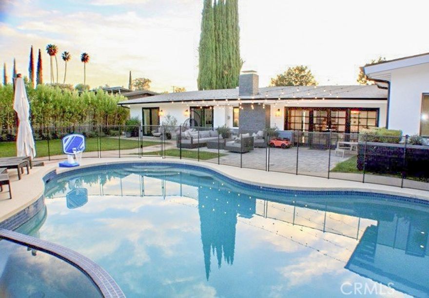 Stunning Mid Century modern designed by Charles Du Bois!  This gorgeous 4 bedroom POOL home is remodeled to the 10’s w/ a contemporary design! Original bright open floorplan w/vaulted ceilings and center island gourmet kitchen featuring white shaker cabinets, quartz countertops, top of the line appliances and 6 burner cooktop with high CFM designer hood. This chefs dream kitchen opens to the spacious living room and the large family room w/ sliders allow easy access to the perfect private backyard with lush landscaping, sparkling pool / spa and multiple patios to accommodate entertaining and outdoor dining! Large circular driveway with 2 car garage and tons of built-ins for storage! Amazing neighborhood in prime location south of the Blvd adjacent to Calabasas close to Bristol Farms, Starbucks, Farmers Market, Commons of Calabasas, The Village and award winning school district!