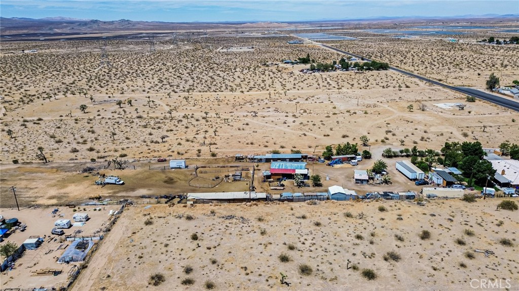 Discover the perfect blend of convenience and opportunity with this spacious 2.12-acre parcel (APN: 0458-126-52-0000, SB County, SE Corner Coordinates: 34.592645, -117.456219) located just minutes from Highway 395. Ideally situated near shopping centers, restaurants, and local schools, this prime location offers both accessibility and potential. Whether you're looking to build your dream home, establish a small business, or invest in future development, this property provides a versatile canvas in a rapidly growing area. Don’t miss out on this rare opportunity to own land with such a desirable combination of size, location, and value.