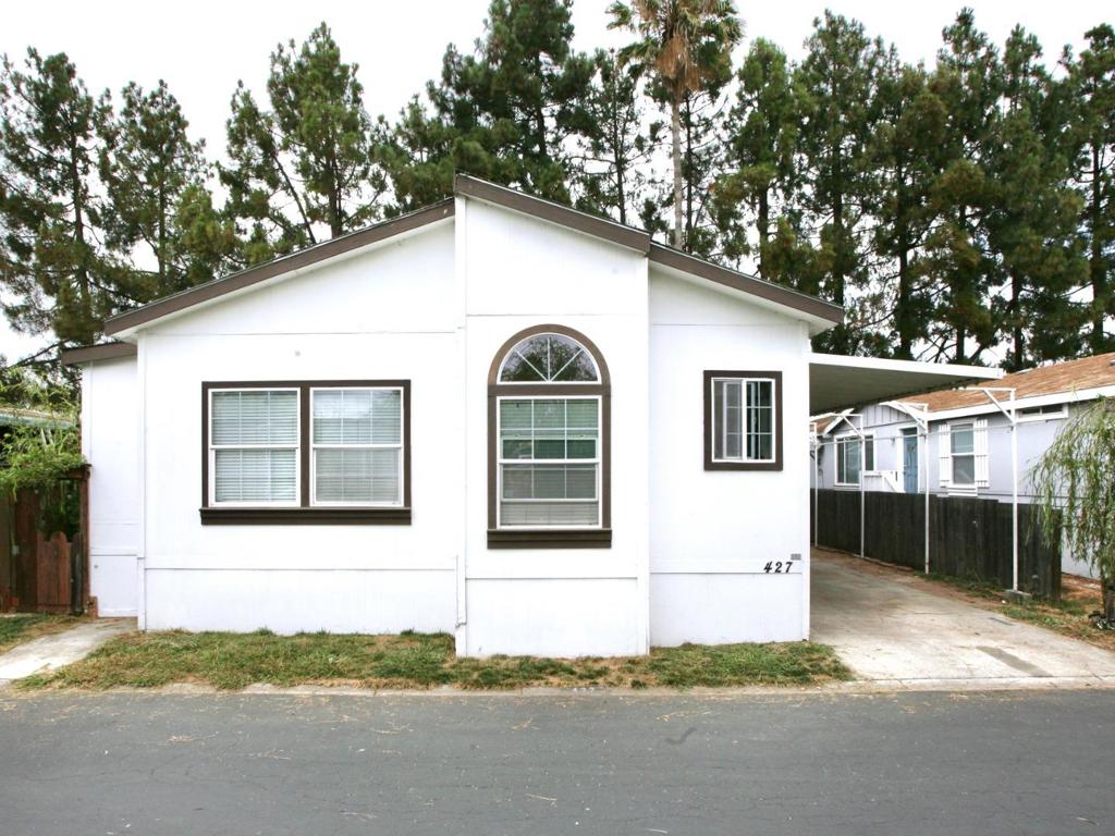 Welcome to this charming mobile home located at 427 Shorewood Ln in San Jose, California; in the heart of Silicone Valley. This well-maintained property build in 2005 by Fleetwood offers an inviting living space with an open floor plan, with 4 bedrooms and 3 full bath providing a comfortable and cozy atmosphere. The lake right by the back yard offer amazing views to watch the wild bird, more so the sunset. The kitchen is equipped with modern appliances and ample storage. Enjoy relaxing or entertaining in the spacious living area. Located conveniently by 237/85/101, Target, Chase Bank and well know restaurants are across the street. Public transportation VTA light rail are mins away. A wonderful opportunity to enjoy comfort and convenience. Reasonable space rent at $1375, capped at 3% rent control.
