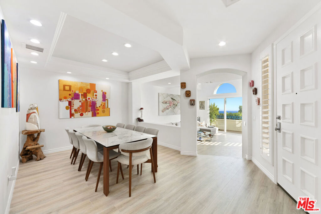 Prime Malibu Location, far removed from fire affected areas, next to Celebrity studded enclaves of Paradise Cove, Point Dume and Zuma Beach. Meticulously renovated with Luxury in mind, by BH Designer Group in 2023, this spacious 3BR+3BA Townhome comes FULLY FURNISHED, ACCESSORIZED with Linens, Glassware, Kitchenware plus Collection of original Modern Art. Indulge your senses on a private Garden/Patio with panoramic Canyon Views, and Ocean Views from Liv. Rm and Primary Suite. Cook your favorite meals in a Gourmet Kitchen w/ exquisite Marble Countertops and top of the line European Appliances. Entertain your Guests in indoor/outdoor fashion. They might never leave! Relax in a Spa style beautiful Primary Bath w/ Ocean Views. For your total comfort other features include Laundry Rm, Vine and Cigar Rm, State of the art Security, Audio/Video Systems, 2 car garage. The Pointe is one of Malibu's most desirable gated Communities offering Swimmer's Pool, Spa, Gym, Tennis Court w/ pickleball lines. Available October 15, 2025.