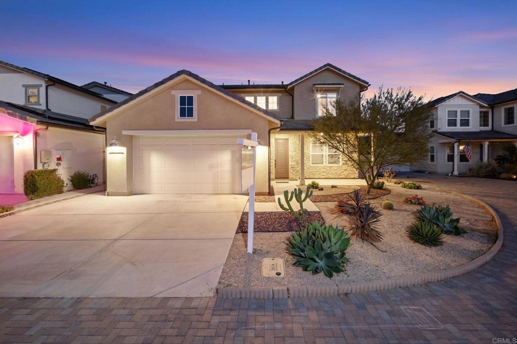 4 Bedroom 3 Full Bath, Contessa model home located in the beautiful, master-planned community of Harmony Grove Village. Indoor/outdoor resort style living at its finest. Open concept kitchen with a large center island w/ seating, soft-close doors and drawers, upgraded lighting fixture throughout, walk-in pantry, quartz countertops, stainless steel appliances, 2 Honeywell smart thermostats, Luxury vinyl plank flooring, laundry room w/ big basin sink, counter space & cabinets conveniently located on the 2nd floor. Covered outdoor space, California Room with built in gas fireplace, TV wiring, recessed lighting, stacking door system, low maintenance landscaped backyard with professionally installed paver stone patio, artificial turf, and fruit trees to enjoy year around. Master suite has walk-in closet, private large balcony with breathtaking mountain views. First level bedroom with full bath. Home has solar panels to keep energy costs low. 3 car garage w/ epoxy floor & driveway for extra parking. Unfurnished. Fridge, washer/dryer included. Community has Olympic sized pool, jacuzzi, BBQ grills, covered lounge area w/fireplace, basketball court, hiking and equestrian trails throughout, multiple private parks & playgrounds, all within walking distance. Elfin Forest Recreational Reserve, San Elijo Hills, Rancho Santa Fe, access to I-78, I-15 nearby. No pets, No smoking.