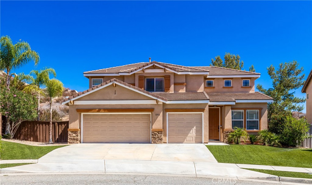 Beautiful 2 story top of cul de sac view home located in the highly sought after master planned " Canyon Hills" community in Lake Elsinore. So much attention to detail in this lovely home. No back neighbors- Just beautiful views. Boosting 2117 square feet with 3 large upstairs bedrooms and 2 full baths. The primary bathroom has a sunken tub and stall shower. The secondary bathroom has a tub/shower combo. Downstairs has a powder room. Upstairs loft/bonus room. Also boosting a separate family and dining room. Rich wood floors and classy tile throughout this home. Central heat and air. Cozy gas fireplace, cool ceiling fans. Custom window coverings, mirrored wardrobe doors. Upstairs dedicated laundry room with storage. Cooks kitchen with stainless steel appliances, center island. Fridge will remain. Entertainers backyard complete with high end astro turf and plants powered by a low water drip system with timer. Large, flat useable pool size backyard approximately 6098 square feet. Newer 9/30/2023 above ground 5 person spa manufactured by Cal Spas. Lots of jets. Spacious 3 car garage with a garage door opener.
The master planned Canyon Hills community has 3 pools, spas and parks. Centrally located close to schools, parks, recreation -Storm Stadium, Lake Elsinore Skydiving, shopping, medical and freeway close, hiking trails ,motorsports, skateparks, A true must see.....