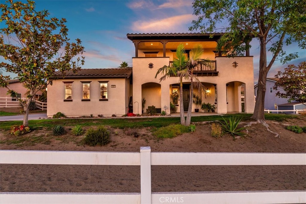 Norco Hills Pool Home with Breathtaking Views!
This stunning 5-bedroom, 3.5-bathroom home in the desirable Norco Hills community has it all – including a sparkling pool, scenic views, and room for everyone.
Downstairs, you’ll find a full bedroom with a nearby powder room – perfect for guests or multi-generational living. The formal living and dining rooms offer ample space for entertaining, with the dining room featuring a cozy double-sided fireplace that opens to the inviting family room.
The open-concept kitchen is an entertainer’s dream, complete with granite countertops and backsplash, stainless steel appliances, upgraded fixtures, and a large island with bar seating.
Upstairs, enjoy a spacious loft and a built-in desk area ideal for work or study. All bedrooms are generously sized with ample storage. The primary suite impresses with high ceilings, a large walk-in closet, and a luxurious bathroom featuring a spa tub and walk-in shower. One secondary bedroom upstairs has its own en-suite bathroom, while the main upstairs bath includes dual vanities and a tub/shower combo.
Step into your backyard tropical paradise with a beautiful, private pool and water wise landscaping. The covered patio feels like a resort retreat, perfect for entertaining or relaxing. An elevated area in the yard is ideal for enjoying sunsets, hosting gatherings, or even accommodating animals – the choice is yours!
This home also features a rare 4-car garage setup (2-car in front, 2-car in back), along with ample parking and RV potential.
And don’t forget the private upstairs balcony, where you can unwind and soak in stunning sunset views.
This exceptional Norco Hills home has everything – just add YOU and start living the Norco lifestyle!
