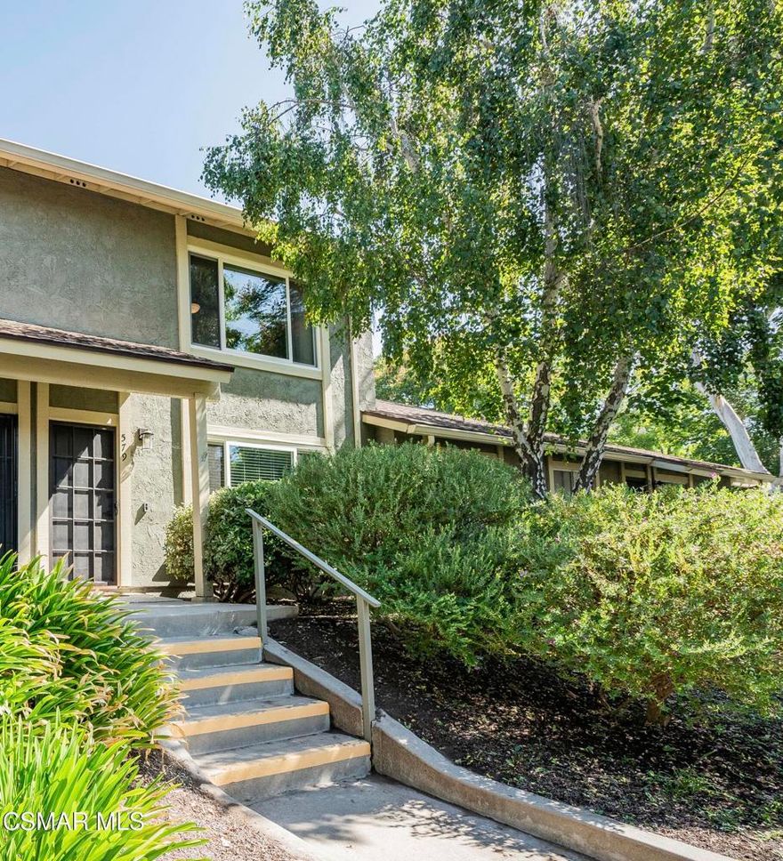 This beautifully upgraded home has a prime location of being situated one door away from Wildwood park entrance, hiking trails, and Wildwood Elementary. Inside is a spacious living room with a large window overlooking the front yard creating the feel of a nature retreat. The updated powder room features a modern vanity, updated lighting, and fixtures.The custom kitchen offers brushed granite countertops, high-function cabinetry, a large island with breakfast bar and storage, and Frigidaire Gallery stainless steel appliances.Off the kitchen, you'll find a walk-in pantry with full-sized washer and dryer, plus a flexible space perfect for a dining table, sofa, or home office. Upstairs, the expansive primary bedroom offers a ceiling fan, space for a desk or sitting area, and serene treetop views of the park. The updated full bathroom boasts a marble vanity and oversized medicine cabinet, with dual access to the hallway and secondary bedrooms--each appointed with ceiling fans and custom blinds.Step outside the large dual-pane Milgard slider to your private patio--ideal for BBQs and entertaining. Beyond the back gate, enjoy direct access to two side-by-side carports, located conveniently close to the home.The community includes a heated pool, conveniently located across the street. With low HOA fees and a prime location, this home truly has it all!