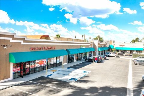 Photo of 10759 Magnolia Ave #E, Riverside, CA 92505 (MLS # IV26036503)