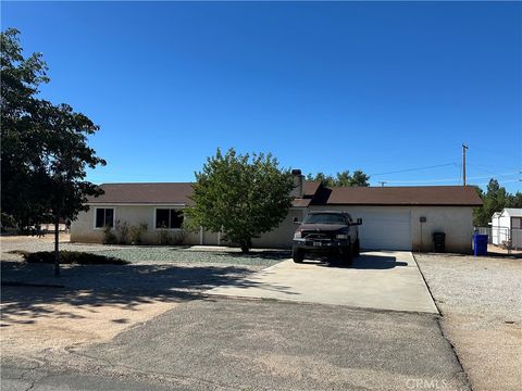 Photo of 11542 Chimayo Rd, Apple Valley, CA 92308 (MLS # HD25230157)