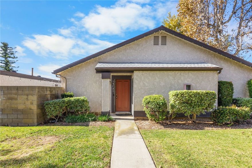 Charming single-story end-unit  located in the City of Orange. This townhome features three roomy bedrooms, two bathrooms, and a spacious private patio. The bright, open layout includes laminate wood flooring throughout. The kitchen and bathrooms have been updated with granite countertops and modern finishes. Conveniently situated with quick access to the 55, 261, and 241 freeways, and just off Chapman Ave. Close to multiple shopping centers, restaurants, and schools. The community offers great amenities including a clubhouse, pool, spa, picnic area, and beautifully maintained landscaping. The HOA covers exterior upkeep and trash service. Additional highlights include a two-car garage, an assigned parking spot, guest parking, and a pet-friendly HOA that keeps the community looking its best.