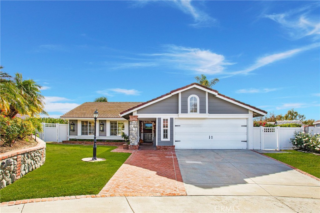 ** VIEWS VIEWS VIEWS ** Airy, open, and undeniably inviting, and one of the largest usable lots available on the market in San Clemente. This three-bedroom and two-bathroom view home sits on a prime corner lot in a quiet cul-de-sac within Forster Ranch. Enjoy the indoor/outdoor entertainment lifestyle San Clemente is famous for, accompanied by incredible vistas and an ocean breeze. Immediately upon entering the house through the Dutch door, the living space opens seamlessly to a formal dining area, kitchen with a new fridge, living room with a stylish fireplace, and new carpet in the bedrooms. Double French doors lead to the backyard from the living, dining, and principal bedrooms. The sprawling grounds encompass nearly 8000 square feet and host a stunning backyard featuring a built-in BBQ, water fountain, panoramic hillside, and city light views. Mere moments from schools, entertainment, dining, greenbelt, and picturesque beaches, there is simply no better place to call home than 1202 Ganado.