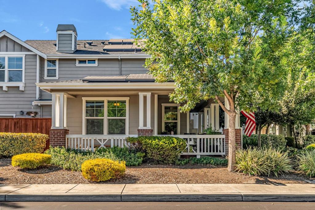 Welcome to this charming 3-bedroom, 2 and a half bath home located in the heart of Gilroy. Spanning 1,490 square feet, this residence offers a blend of comfort and functionality. The kitchen is a chef's delight, featuring granite countertops, beautiful new cabinets, and a gas oven range with double ovens. The open dining area includes a breakfast bar for casual dining. The living room opens to the spacious back patio for indoor-outdoor entertaining. Upstairs you'll find updated bathrooms and two of the bedrooms include walk-in closets. Additional amenities include a walk-in closet, energy-efficient double pane windows, LED lighting, and solar power with battery backup. The laundry facilities are conveniently located on the upper floor. Relax on the covered wrap-around porch or enjoy alfresco dining in the private back patio. Situated within walking distance of the downtown shops & restaurants and a short drive to the Gilroy Outlets & Costco. For those who love the outdoors there are several gorgeous regional parks close by for hiking, camping & bike riding. Don't miss the opportunity to own this delightful home in Gilroy.