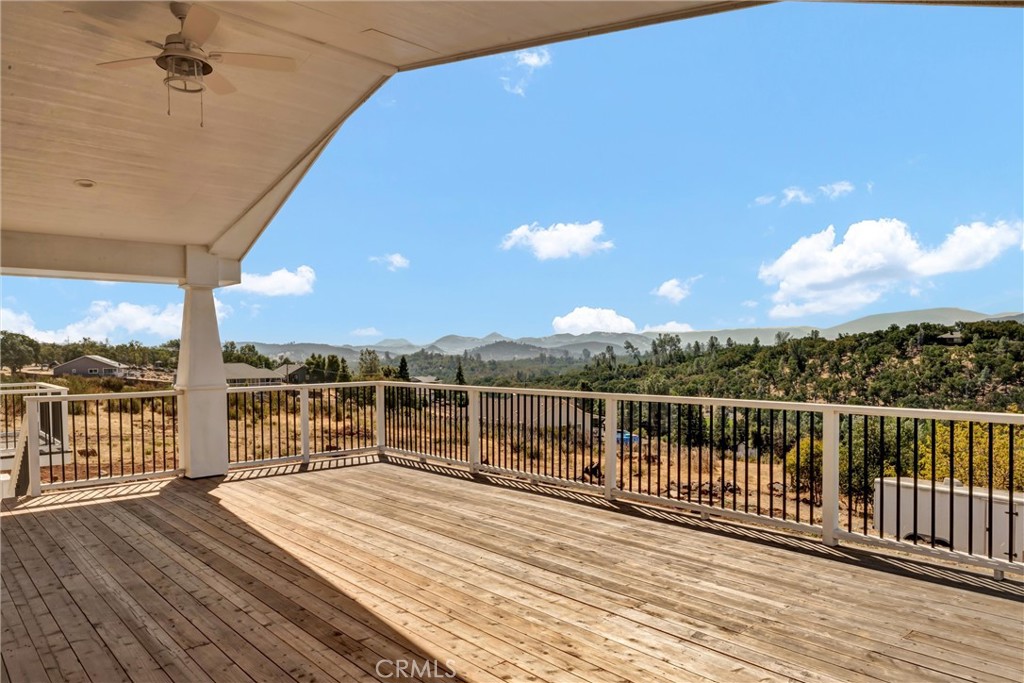 STUNNING custom-built home with valley and mountain views! Experience luxury, privacy and craftsmanship in this beautiful brand new custom-built home situated on a spacious .65-acre lot with only one HOA fee. Boasting 3 bedrooms and 3 bathrooms across 2,040 square feet, every detail of this home has been thoughtfully designed with high-end finishes and modern comforts. Inside, solid red oak hardwood floors with mahogany picture frame trim add timeless warmth and character. The open-concept living area features a cozy gas fireplace with ceramic slate-look tile surrounding it and a remote control for effortless ambiance. Mini-split systems throughout ensure efficient heating and cooling in every room. The beautifully designed kitchen is a true highlight, with quartz countertops, a porcelain farmhouse sink, beveled subway tile backsplash, soft close top cabinets, a 36" gas oven and 6 burner gas stove, plus an additional electric oven - perfect for entertaining and everyday gourmet cooking. Not to mention the butlers pantry off the kitchen for additional storage and built in desk. Retreat to the spacious primary suite, complete with a large walk-in closet, private balcony, and a luxurious en-suite bathroom featuring a soaking tub, walk-in shower, dual sinks and a built-in vanity. This home also features a 3 car attached garage with a dedicated electric car circuit and 12' high ceilings for potential for a car lift for any buyer. Step outside to the expansive outdoor deck, which is partially covered, and ideal for year-round enjoyment. Additional features include: an on-demand hot water heater, hand-laid brick driveway, located adjacent to equestrian trails, offering peace, privacy and a connection to nature. Enjoy sweeping views of the valley and mountains from the comfort of your own home! This one-of-a-kind property blends quality craftsmanship with the perfect blend of rustic charm and modern living. Schedule your private showing today!