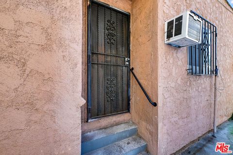 Photo of 220 E Vernon Avenue #1/2, Los Angeles, CA 90011 (MLS # 26660055)