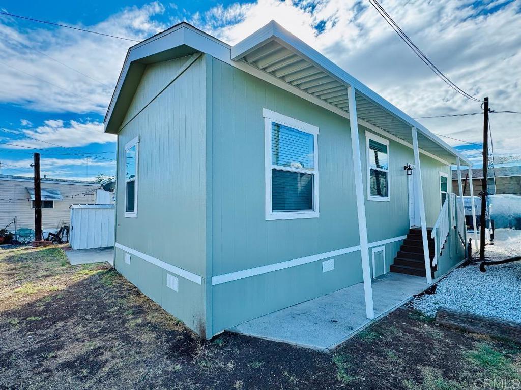 Beautiful and Cozy, Brand NEW Manufactured Home in ALL-AGE, Shady Lane Community. 2025, Champion Manufactured Home, 2 Bedroom and 1 bath home. Home features include: High Ceilings, kitchen with stove and refrigerator included, easy to clean and maintain vinyl flooring throughout home, central heating and AC, fans, washer and dryer hook-ups, Space rent is one of the lowest in the county $900 with no age restrictions. The community is well maintained and centrally located near grocery stores, malls, restaurants, banks, post office, transportation, and freeways. Great opportunity and economical way to live in America's Finest City, Gorgeous San Diego! Come see this home before it’s gone! Schedule a personalized showing today!