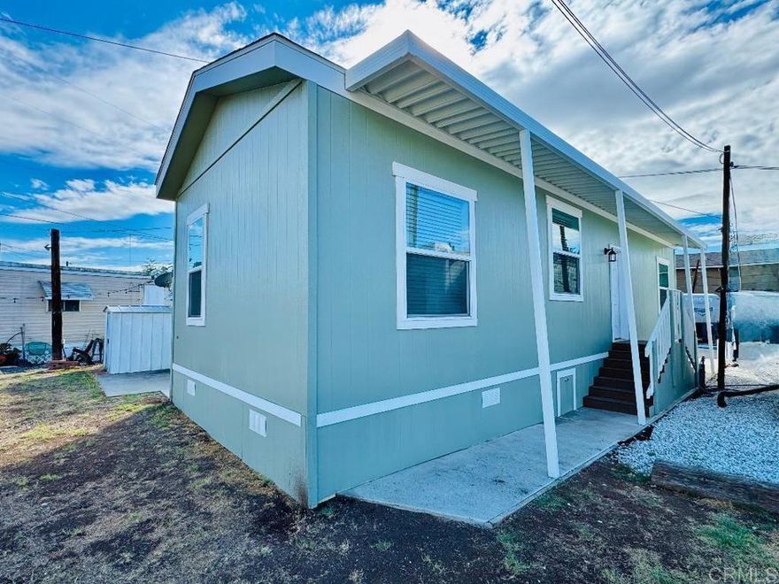Beautiful and Cozy, Brand NEW Manufactured Home in ALL-AGE, Shady Lane Community. 2025, Champion Manufactured Home, 2 Bedroom and 1 bath home. Home features include: High Ceilings, kitchen with stove and refrigerator included, easy to clean and maintain vinyl flooring throughout home, central heating and AC, fans, washer and dryer hook-ups, Space rent is one of the lowest in the county $900 with no age restrictions. The community is well maintained and centrally located near grocery stores, malls, restaurants, banks, post office, transportation, and freeways. Great opportunity and economical way to live in America's Finest City, Gorgeous San Diego! Come see this home before it’s gone! Schedule a personalized showing today!