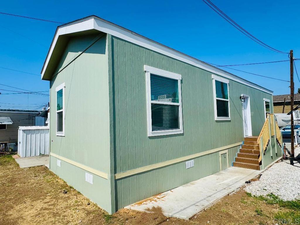 Beautiful and Cozy, Brand NEW Manufactured Home in ALL-AGE, Shady Lane Community. 2025, Champion Manufactured Home, 2 Bedroom and 1 bath home. Home features include: High Ceilings, kitchen with stove and refrigerator included, easy to clean and maintain vinyl flooring throughout home, central heating and AC, fans, washer and dryer hook-ups, Space rent is one of the lowest in the county $900 with no age restrictions. The community is well maintained and centrally located near grocery stores, malls, restaurants, banks, post office, transportation, and freeways. Great opportunity and economical way to live in America's Finest City, Gorgeous San Diego! Come see this home before it’s gone! Schedule a personalized showing today!