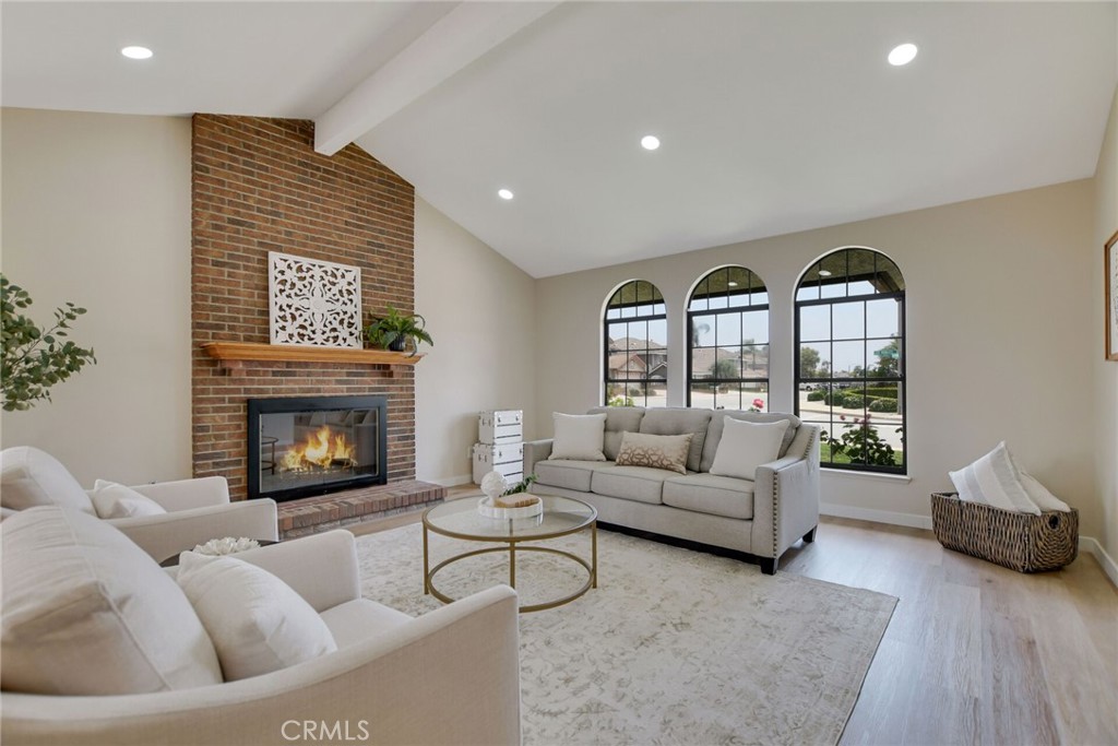 This immaculate, move-in-ready single-story home in prestigious North La Verne offers a perfect blend of luxury, comfort, and harmonious design principles. Soaring ceilings and abundant natural light create an open-concept floor plan. The chef’s kitchen and elegant gathering spaces seamlessly connect to a lush backyard with panoramic mountain views—ideal for family living and entertaining. The well-appointed primary suite features a walk-in closet and an upgraded dual vanity en-suite, complemented by two additional bedrooms and a remodeled hall bath. Premium upgrades like new flooring, recessed lighting, fresh paint, and modern bathrooms underscore meticulous care. With RV parking and access to the award-winning Bonita Unified School District, this refined, turnkey home embodies upscale California lifestyle, long-term investment value, and thoughtful design that resonates with buyers seeking excellent quality.