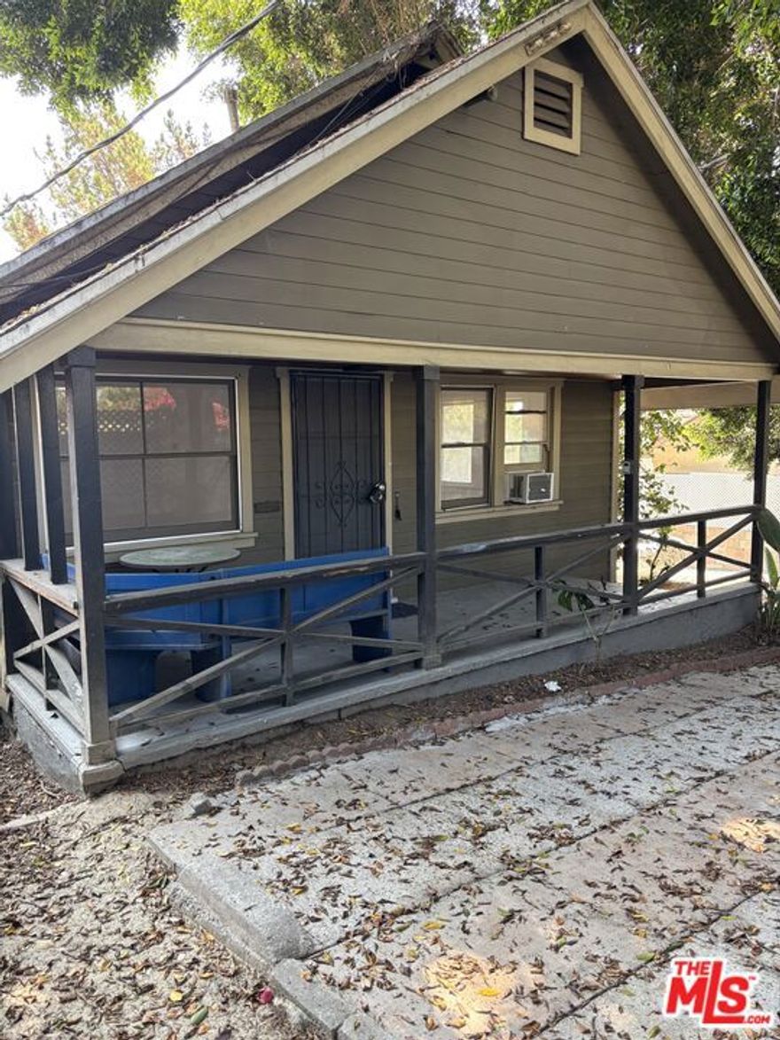 Silver Lake 2BD/2BA California Bungalow.  Step into the charm of this authentic 1920s bungalow, perfectly nestled on a 4,000 sq ft lot in one of Silver Lake's . This 2-bed, 2-bath cottage blends vintage character with modern convenience, featuring:  hardwood floors throughout.   Updated kitchen with stainless steel appliances: microwave, dishwasher, stove/oven, refrigerator.   Window A/C for comfort, Stackable washer/dryer hookups for easy laundry.   Gated parking for 1 vehicle.   The home's warm, inviting ambiance, low-traffic location, and true cottage feel make it a rare find in Silver Lake/Echo Park Area.