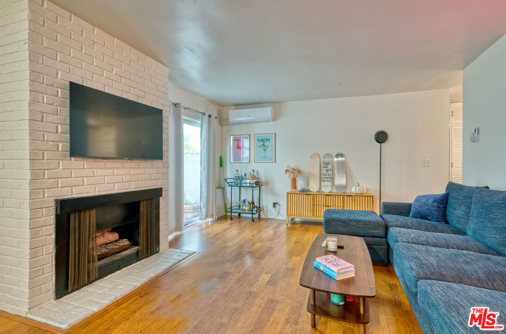 Cheerful 3 bedroom + 2 bath ground floor condo is ready for you to move right in! Great Santa Monica location in the popular College Street Neighborhood, and close to everything the Westside has to offer. Step into a spacious living room with gas fireplace that opens to a dining area, small patio, and a modern kitchen with granite countertops. The primary-bedroom suite has a walk-in closet. Central hall with laundry cabinet (with washer/dryer), linen closet, 2nd bath and access to primary bedroom suite across from the secondary bedrooms. One of the secondary bedrooms features a sunny patio. There's also one-car covered parking with extra storage area. This friendly, well-maintained 7-unit building is just moments away from Erewhon, excellent restaurants, the Expo Line, parks, and freeways.