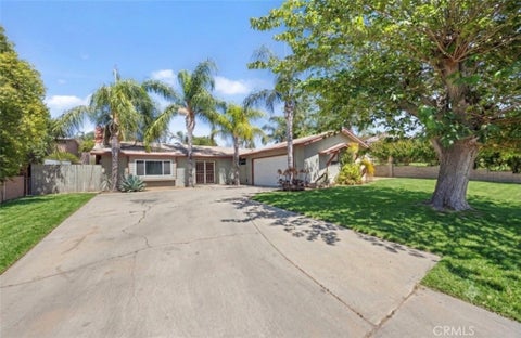 Photo of 10937 Desert Sand Avenue, Riverside, CA 92505 (MLS # DW26127771)