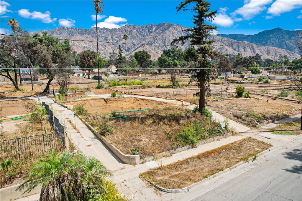 Nestled in a prime location with breathtaking mountain views, this expansive lot on coveted Mariposa Street offers a rare chance to build your dream home in one of Altadena’s most desirable neighborhoods. Just minutes from the vibrant commercial district, you'll enjoy both tranquility and convenience.
The original home was lost in the Eaton Fire, and the property is now being offered as land only—an ideal canvas for new construction with endless potential.