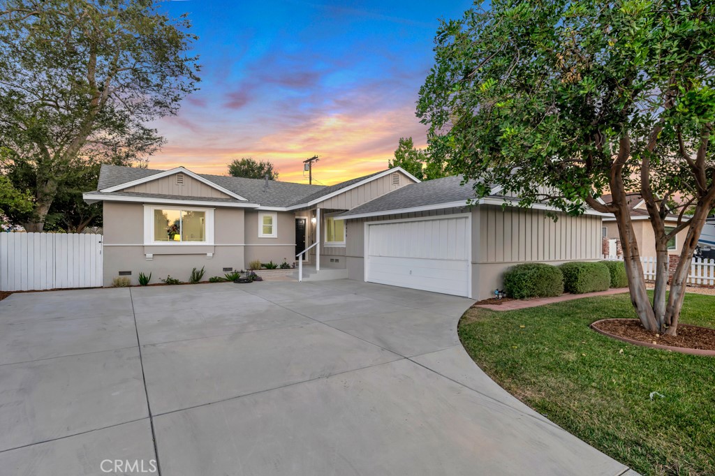 Welcome to this beautifully updated 4-bedroom, 2-bathroom home on a spacious 7,815 sq ft flat lot located in one of West Hills’ most desirable neighborhoods. The owners invested nearly $100,000 in upgrades throughout the home, ensuring turnkey comfort and style. Spanning 1,575 sq ft, this residence blends modern expensive upgrades with everyday comfort and style. Inside, you’ll find new luxury vinyl plank flooring, recessed lighting, and a fully remodeled kitchen featuring quartz countertops, stainless steel appliances, gorgeous light fixtures, and plenty of counter space and storage—ideal for both home chefs and everyday living. The light-filled living room is anchored by a cozy fireplace, creating a warm and inviting sprawling gathering space. The primary suite includes its own en-suite bathroom, while three additional guest bedrooms share a beautifully updated hall bath. A bonus room staged as an additional living space adds flexibility for a dining room, playroom, or media area. Located in the sought-after Welby Way school district, footsteps away from a plethora of amenities, and only minutes from Westfield Topanga, The Village, parks, and dining, this West Hills gem delivers both convenience and modern living.