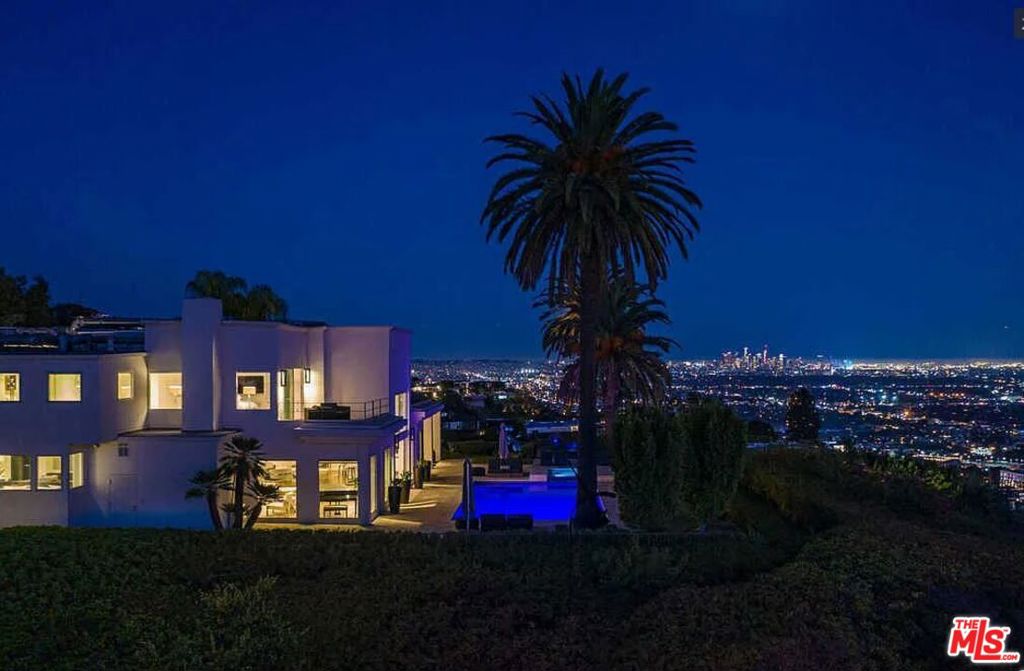 The Mockingbird Estate, a once in a lifetime opportunity to own one of the largest view promontories in Los Angeles offering the most incredible site in the super prime Bird Streets - two minutes above the Sunset Strip. Enter to a gated, 700 ft long private driveway which leads to an incomparable private and resort-like oasis set on almost 1.6 Acres with panoramic views over LA. There is currently a 14,000 SF contemporary home featuring a grand foyer, two-story living room, six en-suite bedrooms including a 2,500 SF primary suite with two private terraces, theatre, expansive lawn, pool, parking for over 20 cars, and unobstructed views over the city from downtown to the ocean. Shown to pre-qualified clients only.