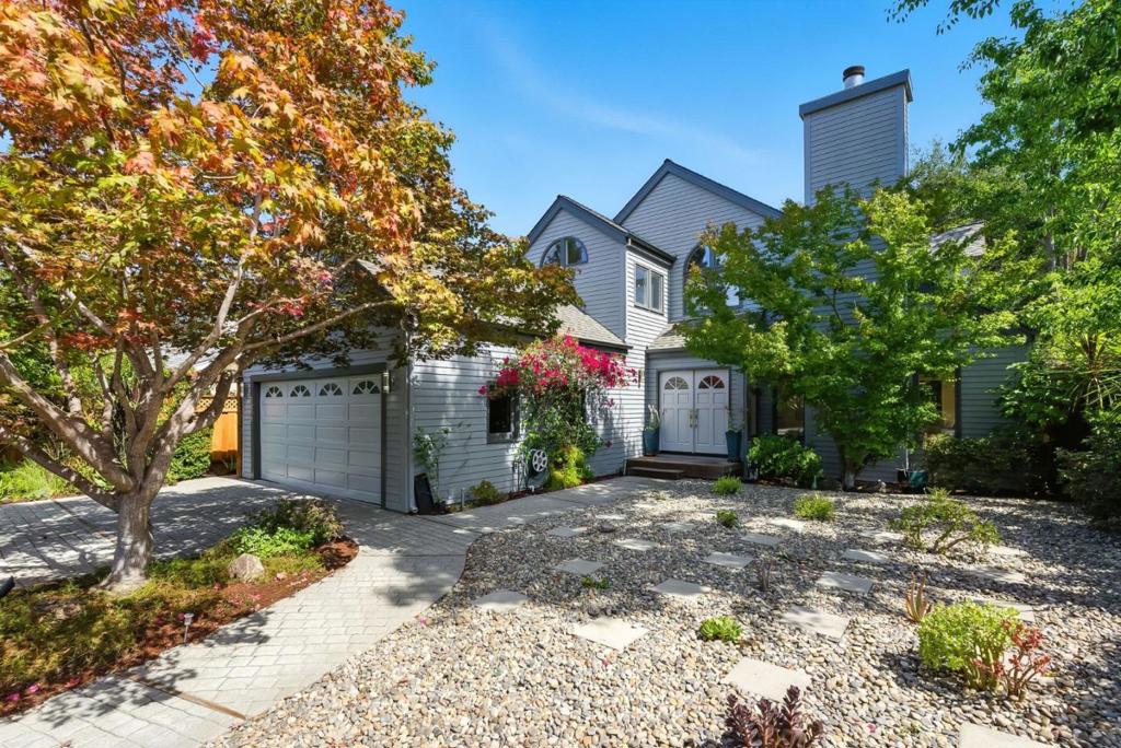 Tucked away on a quiet, tree-lined street, 715 Matadero Ave is a light-filled home that blends comfort, elegance, and versatility. With soaring ceilings and abundant natural light, this spacious layout is ideal for everyday living and effortless entertaining. The main level features a generous living room, formal dining room, and an inviting family room off the kitchen is perfect for casual gatherings. The gourmet kitchen includes ample counter space and two dishwashers for easy entertaining. A main-floor bedroom and full bath provide flexibility for guests, multigenerational living, or a home office. Upstairs, three vaulted-ceiling bedrooms include a serene primary suite with private balcony overlooking Matadero Creek. Two additional bedrooms and a full bath complete the upper level. A bonus attic space -- not in the square footage -- offers the ideal retreat for an office, studio, or storage. Enjoy outdoor living on the expansive redwood deck with tranquil views of the creek and surrounding greenery -- perfect for alfresco dining. With a two-car attached garage, flexible layout, and a prime Palo Alto location near shops, restaurants, parks, and top-rated schools (buyer to verify), this home is a rare find.