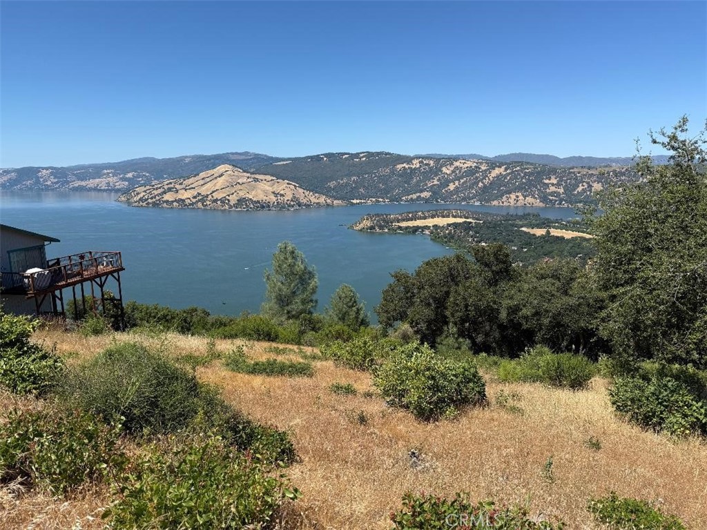 Gorgeous views of Clear Lake and Buckingham peninsula from this Riviera Heights residential parcel. Over half an acre with Septic approval on file and water hookups at the road. Looking for more space, adjacent lot at 7528 Evergreen also available! Enjoy Riviera Heights ownership with its clubhouse, pool, and marina with boat launching, fishing, picnicking and a swimming lake front!
