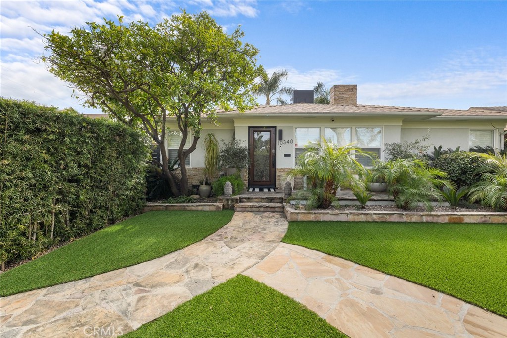 Welcome to 10340 Margate St in North Hollywood, a beautifully updated property offering exceptional space, style, and versatility. This unique residence features a 3-bedroom, 2-bathroom main house spanning 1,559 square feet, perfect for family and entertaining. Step inside the main house to find fresh paint, updated bathroom sconces, and a newly added coffee bar that enhances the modern charm of the home. The living room and laundry area feature elegant porcelain flooring, adding both durability and style. The kitchen is a chef’s dream, featuring all Viking appliances and sleek granite countertops that add both elegance and functionality. A newer roof ensures peace of mind, while upgraded landscaping with heat-resistant plants provides a low-maintenance yet beautiful outdoor setting. Outside, enjoy ultimate relaxation in the sparkling swimming pool, perfect for warm California days. The backyard is designed for both entertaining and comfort, featuring an outdoor bar and grill area, complete with an ice maker, fridge, freezer, beer tap, and an overhead heater to keep guests comfortable year-round. Electric blinds at the bar area provide added convenience and shade when needed, while an outdoor fire pit creates the perfect ambiance for cozy gatherings. The automated and secure driveway gate provides added privacy and convenience. This home is ideally located within walking distance to Porto’s and offers an incredible blend of indoor and outdoor living, a thoughtfully designed guesthouse, and stunning upgrades throughout. Don’t miss this rare opportunity!