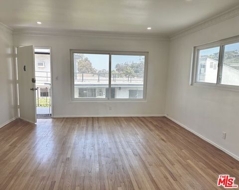 Photo of 4205 Don Tomaso Drive #4, Los Angeles, CA 90008 (MLS # 26830801)