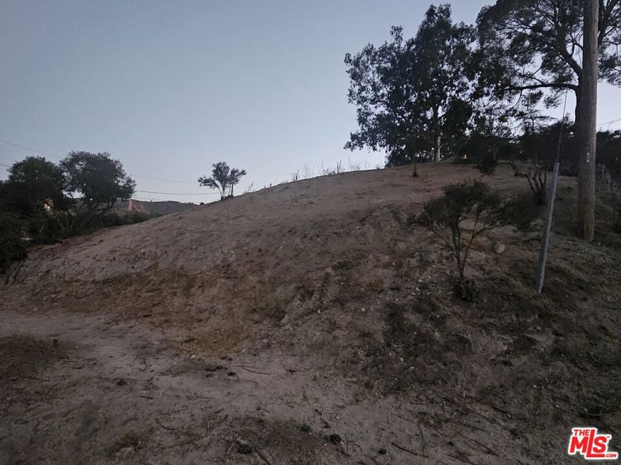 Stunning Tujunga hillside lot with city views!!! Discover the perfect opportunity to build your dream home on this spacious hillside lot nestled in the tranquil community of Tujunga. APN 2563-037-038 offers breathtaking panoramic views of the city and surrounding mountains, creating the ideal backdrop for a private retreat or custom residence. Located on a quiet cul-de-sac, yet just minutes from local shops, dining, and freeway access, this parcel combines peaceful living with convenient city connections. Don't miss the chance to own land with endless potential and spectacular views.