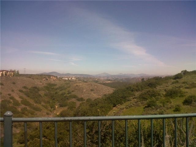 Very Rare Opportunity at end of quiet street with canyon views! Bright and open floorplan with great space for family and friends entertaining. Designer features such as granite and travertine,fully equiped kitchen opens to family room with fireplace and direct yard access. Lush Landscaping surrounds this spacious yard with pool and extra large spa, grass area with fruit trees and views, views, views. Gardener and pool service included so just relax and enjoy. Neighborhoods: St Augustine