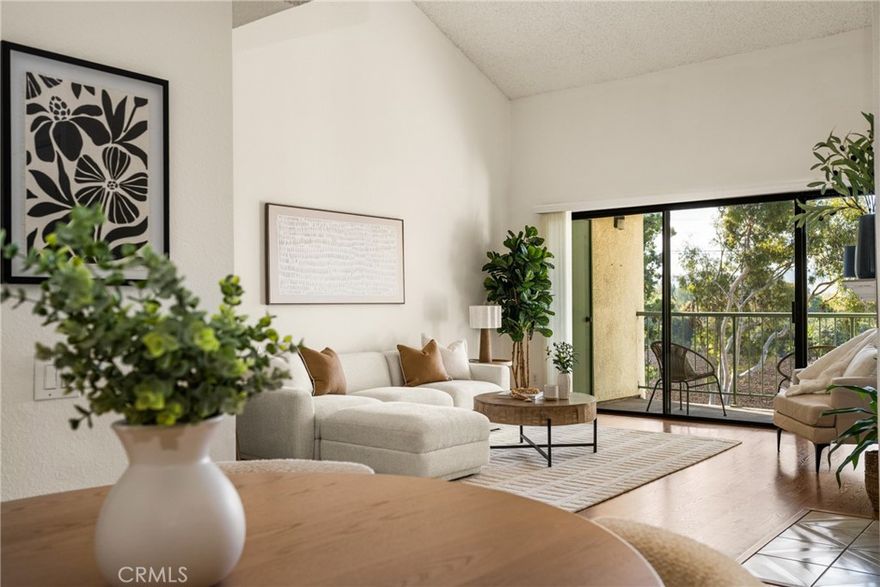 Penthouse Condo with Loft & Stunning Views in Orange Tree Terrace, Irvine. Welcome to your new home in the desirable Orange Tree Terrace community, a rare top-floor penthouse with unobstructed views of wide-open spaces. This light-filled 2-bedroom, 2-bath condo PLUS loft offers an airy, spacious feel thanks to soaring vaulted ceilings, freshly painted crisp white walls, and tile and laminate flooring that enhance the open layout. Enjoy a bright white kitchen with tiled counters, white cabinetry and stainless-steel appliances, open to the spacious living room with fireplace. The primary suite and adjacent bathroom have ample closet space, two sinks and a tub/shower combo. The secondary bedroom has its own bathroom with walk in shower. The versatile loft is ideal for a home office, guest space, gym, or creative studio — bathed in natural light and open to the spacious living area below. The expansive balcony runs the full length of the condo, providing gorgeous views from every room. This secure three-story building features elevator access, so getting to your penthouse — or down to the subterranean parking garage — is effortless. No stairs are needed! There’s also ample guest parking just outside the building and controlled access for visitors, offering peace of mind and convenience. This condo also offers indoor laundry. Enjoy resort-style amenities including a sparkling pool, spa, tennis and pickleball courts, and more. The HOA covers water, and with all electrical appliances, your overhead is minimal. Located next to the Oak Creek Golf Course and minutes from Irvine Valley College and other top-rated educational institutions, superb shopping and easy access to many freeways, this home places you in the heart of Irvine — one of the safest, most sought-after communities in Orange County. Come experience the comfort, convenience, and lifestyle that make this penthouse condo truly special.