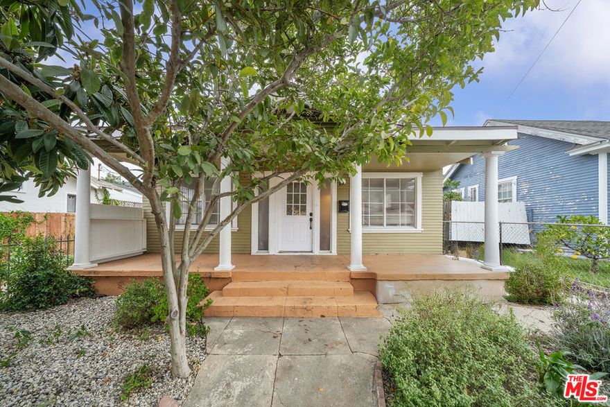 This charming 1920s Craftsman is ideally situated in the heart of Highland Park on a generous lot with coveted off-street parking. The home offers two spacious bedrooms plus a flexible bonus room currently used as a third bedroom, along with a well-sized bathroom and a functional, easy-flow layout. The kitchen opens directly to an expansive backyard, creating a seamless indoor-outdoor connection perfect for entertaining, gardening, or future expansion. A mature citrus tree anchors the yard, providing both abundant fruit, natural shade, and privacy enhancing the space's character and usability. Enjoy a prime, walkable location just moments from Civil Coffee, The Greyhound, local shops, and the Metro station, all while being surrounded by the charm, culture, and community that make Highland Park one of LA's most sought-after neighborhoods.