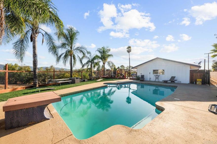 Valley Center Retreat! This 4 bed, 2 bath single-story ranch on 3.20 acres offers flexibility with a bonus room that can be used as a theater and a beautifully designed 2 bed, 2 bath ADU and 2 added bonus rooms — ideal for guests, multi-gen living or rental income. Including an RV flat with an RV currently hooked up (electrical, sewerage and water) with its own patio and deck with a separate storage.   Features include an open floor plan, central cooling/forced-air heating, private pool, expansive fenced grounds, and ample parking for RVs, boats or multiple vehicles and extra carport.  The ADU shines with modern finishes and high-end appliances, adding style, function, and value to this versatile property...  Enjoy peaceful country living just minutes from local amenities!