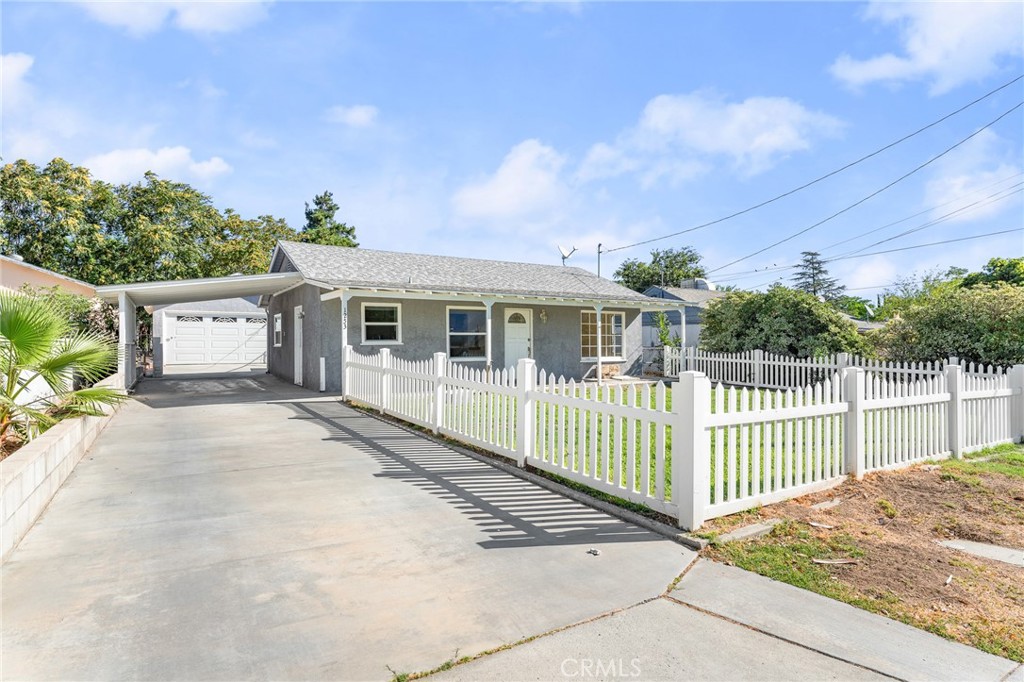 Welcome home to this turn-key bungalow on a spacious lot. This fully renovated home contains 2 bedrooms and 1 full bathroom along with a large laundry room with a full closet for added storage. The 2 car detached garage with ADU potential has an automatic garage door opener and access to the backyard. An extended driveway provides parking for multiple cars. Central air and heat add comfort while new windows have been installed for energy efficiency. Both front and rear yards have irrigation installed and are fully fenced. The covered front porch provides a peaceful setting for morning coffee in this peaceful neighborhood. Priced to sell, this cozy home has it all!