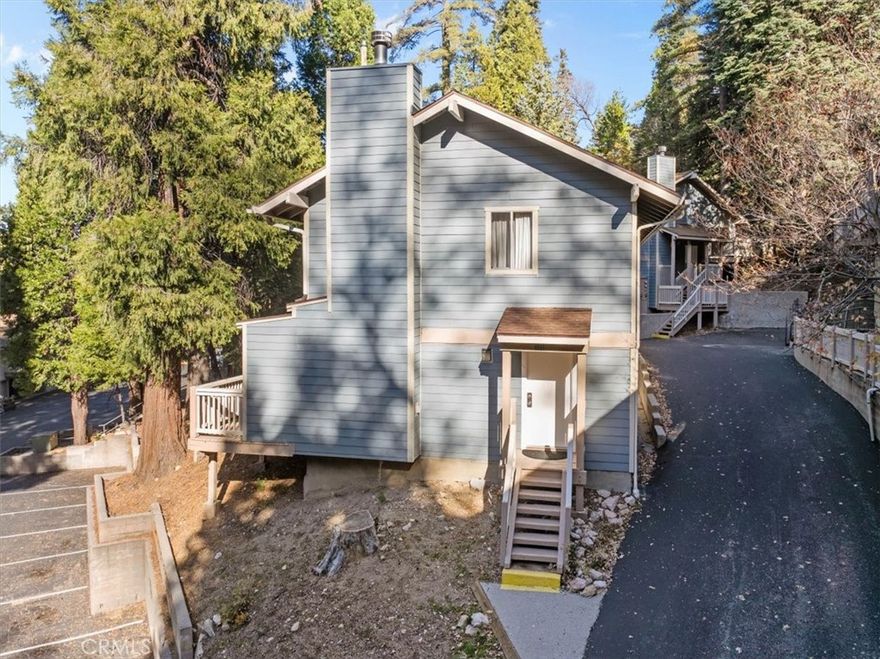 1ST YEAR HOA FEES PAID BY SELLER + WILLING TO HELP WITH CLOSING COSTS! Experience mountain living at its finest in this beautifully maintained home, ideally situated in the charming Lake Arrowhead Chalet Community. This inviting 2-bedroom, 1.5-bath residence offers serene forest views and a bright, open floor plan perfect for relaxing or entertaining. Enjoy a spacious living area with a cozy fireplace, abundant natural light, and access to a large deck—ideal for taking in the peaceful surroundings. The kitchen features granite countertops, matching appliances, and plenty of cabinet space. Additional highlights include ceiling fans throughout. Community amenities include a sparkling pool, soothing spa, clubhouse, and lake dock access. Located close to top-rated schools, restaurants, and local shopping, this turnkey home offers incredible value in a prime Lake Arrowhead location. Don’t miss your opportunity to make it yours!