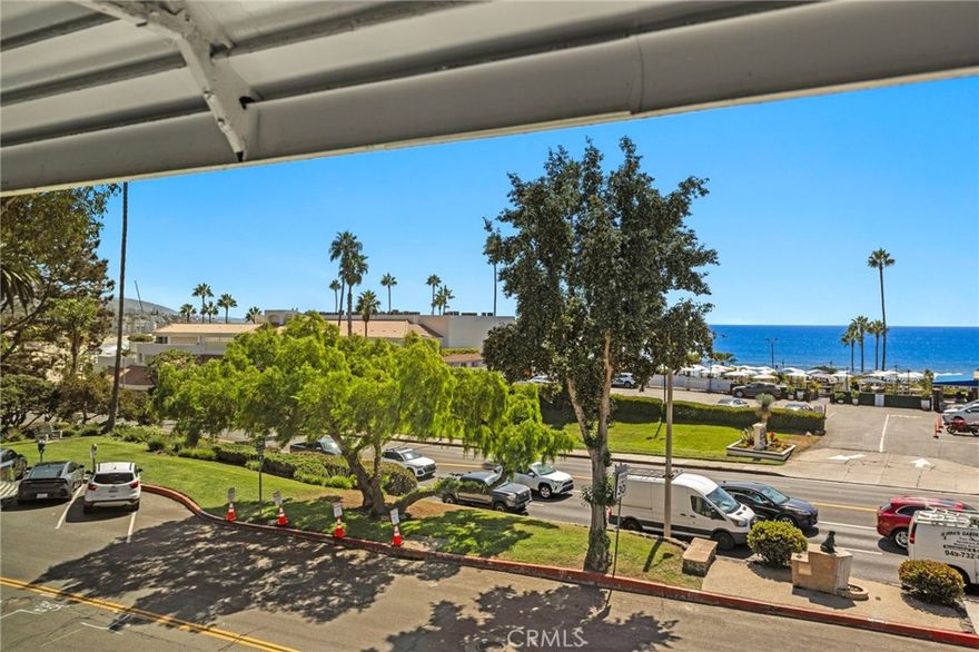 Ocean view, upper end unit condominium in North Laguna right across the street from the ocean front with views of the sand on Main Beach. In the heart of the downtown and North Laguna's vibrant areas, there's so much to do and see right outside your door! Remodeled and in excellent condition, this condo has not been lived in since the updating was completed. Refinished hardwood flooring throughout with an open, airy feel. Living room and the two bedrooms look out to the ocean view amd featire dual paned vinyl windows throughout. Kitchen updated with stainless steel range and built-in microwave. Kitchen and bathroom have new cabinetry with soft close doors, stainless hardware, plus new Quartz stone countertops and sinks. Remodeled bathroom features subway tiled shower with new glass door enclosure. Truly turnkey and ready for move in. Community laundry is conveniently located right near the unit. In a building of only 16 condos, this one boasts one of the best ocean views being on top and on the end! Heisler Park and gazebo, Laguna Art Museum, Las Brisas, Urth Café, trolley stops are all right across the street. Just yards to Main Beach, the central downtown streets of Ocean, Forest and Broadway with a multitude of restaurants, stores, night life and every day shopping conveniences for ease of living at the beach.