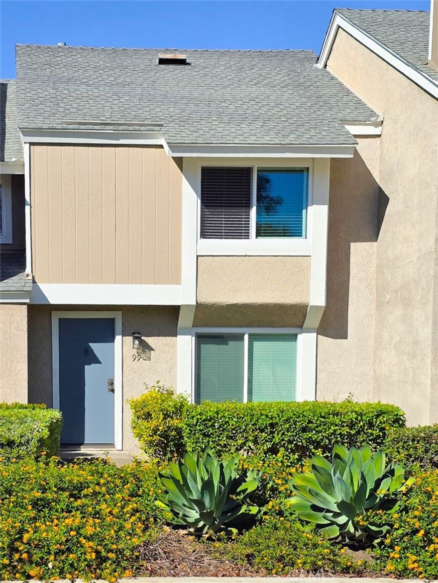 Welcome to this bright and tastefully remodeled 2-bedroom, 1.5-bathroom townhouse in the heart of Irvine's desirable Woodbridge community. With brand new dual pane windows and sliding doors, new cordless blinds, and new ceiling lights/fans as well as newly remodeled kitchen, this property offers exceptional value. As you enter this light and bright and move-in ready townhouse, you will appreciate the inviting living room with freshly painted walls, newer laminate flooring and a cozy fireplace. The large window in this room not only brings in an abundant amount of light but also provides a great view of the trees and the neighborhood. The dining room and kitchen are located at the back of the home. The kitchen has been fully remodeled with brand-new cabinets, a deep stainless-steel sink, designer backsplash, and countertop, and a new dishwasher. A pair of brand new sliding doors leads to the privately fenced patio space that is perfect for the homeowners to enjoy morning coffee, evening dinner, or other outdoor activity. A carport with space for two cars is located directly behind the patio for easy access. A laundry room adjacent to the kitchen not only hosts your washer and dryer but also provides extra storage space. The hallway between the living and dining rooms provides access to a hall closet and a half bathroom. The two spacious bedrooms and one full bathroom are located on the second floor. The primary bedroom has a walk-in closet while the second bedroom has a large closet with new custom tri-panel sliding doors with floor-to-ceiling mirrors. Custom organizers have been installed in both closets. Conveniently located with walking distance of Eastshore Elementary school and Irvine Valley College, this home is next to the nearby park with playground, sand volleyball, basketball, swimming pool and spa. Woodbridge residents have access to all the amenities the award-winning Woodbridge Village has to offer. This includes 24 pools, 2 lakes, 2 lagoons, countless playgrounds, 22 tennis courts, and much more. Centrally located in the city of Irvine, within the nationally ranked Irvine School District, only minutes away from the University of California Irvine, South Coast Plaza, Irvine Spectrum, Fashion Island, and the beautiful Southern California beaches.