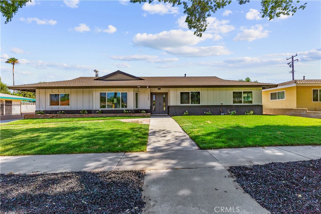 Welcome to this beautiful home! This home features 4 bedrooms, 2 1/2 bathrooms, with remodeled kitchen, remodeled bathrooms, new flooring new roof, beautiful landscaping in front and back, new windows and a nice size backyard with BBQ island that is perfect for entertaining. This home also includes a 2-car detached garage with a long driveway for additional parking. Don't miss out on this amazing turnkey home in a beautiful and tranquil treelined street.