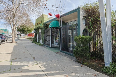 Photo of 440 W Holt Ave, Pomona, CA 91768 (MLS # RS26219577)