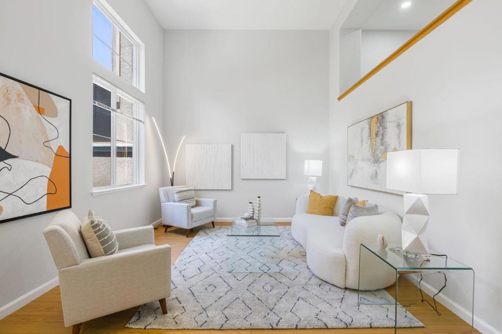 Welcome to this stunning 3 bedroom townhouse that features an open floor plan with a perfect blend of space, comfort, and contemporary lifestyle in Mission Garden gated community and with top rated Rivermark school. The formal living room features soaring 20-foot ceilings and tall windows with views of the front patio. Enjoy this open plan including a bright living area, a dining area, and updated kitchen with brand new quartz countertops, and freshly painted cabinetry. Upper level offers a generous master suite with walk-in closet, large, updated bathroom with dual sink vanity, soak-in tub and separate shower and new light fixtures. Brand new interior paint, double pane windows, recessed lights, laminate flooring, central heating and cooling & new light fixtures thru out. Laundry is located on the upper level for daily convenience, washer and dryer are included. Side by side 2 car garage with ample storage space. The home is conveniently located close to Rivermark Plaza, Levi's Stadium, Oracle & many Hi-tech companies, Santa Clara Library, park, walking trail and top-rated Don Callejon School. Easy access to freeways and expressways. Don't miss out on this move-in ready home in the heart of Silicon Valley! Enjoy the amenities like community pool and children's play area.