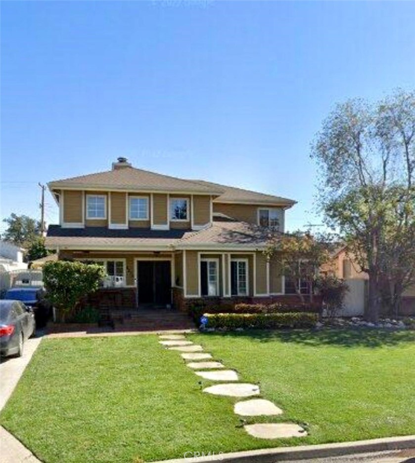 Spacious Lakewood Village Pool Home on an Oversized Lot!
Welcome to this versatile and inviting two-story home in the heart of Lakewood Village. Situated on a generous lot, this property offers great curb appeal and endless possibilities. Step inside to a bright, open living space with soaring ceilings, a striking fireplace, and a charming staircase that sets the tone for the rest of the home. The main level features a primary suite, two comfortable living areas, a powder room, and a well-appointed kitchen that opens to an entertainer’s dream backyard—complete with a sparkling pool, spa, and outdoor bar seating. Upstairs, you’ll find three additional bedrooms, including a second enormous primary suite with its own private balcony overlooking the pool. A dedicated laundry room and ample storage space add everyday convenience. Additional highlights include central AC, a detached two-car garage, and a fantastic location in an award-winning school district. Enjoy easy access to the beach, local parks, and major freeways. This Lakewood Village gem truly has it all—space, style, and location!