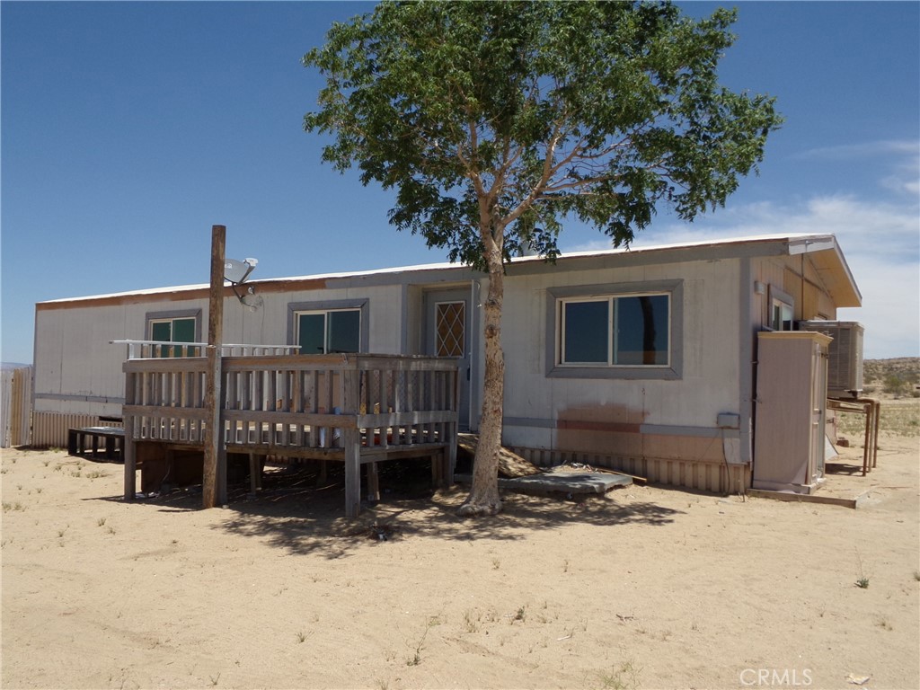 Owner Carry Option for this Handyman Special in Johnson Valley! Escape to the serenity of Johnson Valley with this 2-bedroom, 2-bathroom manufactured home. Nestled on over 2 acres of land, this property offers plenty of space for outdoor activities, gardening, or even future expansion. Inside, you'll find a living area with a woodstove. The home also features a separate laundry room and ample storage space. With an electric meter already in place and a well with water tank, this property offers the convenience of with modern comforts. Whether you're seeking a peaceful retreat or a potential investment, this property is a must-see. Don't miss the chance to own a piece of Johnson Valley paradise!