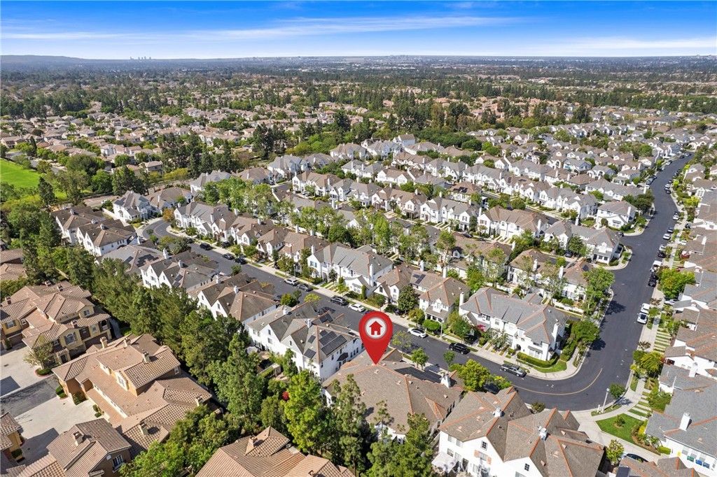 Photo of 66 Turnbury Ln, Irvine, CA 92620 (MLS # OC26052161)