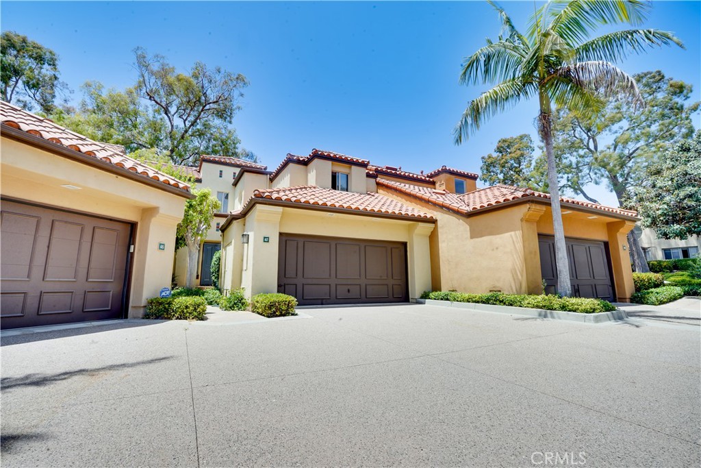 Exuding timeless elegance and contemporary sophistication, this impeccably renovated 2-bedroom, 2.5-bathroom residence is a rare offering in one of Newport Beach’s most exclusive enclaves—just moments from Fashion Island and the prestigious Big Canyon Golf Course. Designed with an eye for detail and a commitment to quality, every finish has been curated to elevate everyday living into an artful experience.
Step into a reimagined interior where new flooring, recessed lighting, and finishes set the stage for effortless refinement. The re-envisioned kitchen is a masterpiece—featuring soft-close, dovetail cabinetry with full-extension roll-out trays, quartz countertops, and premium stainless steel appliances. A charming breakfast nook and formal dining space flow seamlessly into an inviting living area anchored by a contemporary fireplace, opening to a private patio—ideal for elegant alfresco entertaining.
The upper level unveils a truly luxurious primary suite, complete with its own fireplace, serene sitting area, private balcony, and spa-inspired ensuite featuring a freestanding soaking tub, walk-in shower, dual vanities, and generous closet space. The secondary bedroom offers a delightful peek-a-boo view of the golf course, while the newly added upstairs laundry enhances convenience and functionality.
Additional highlights include a private two-car garage with direct access and abundant storage. This community offers exclusive amenities including a resort-style pool and spa, modern fitness center, and a beautifully appointed clubhouse—all surrounded by lush greenbelts and mature landscaping.
Unmatched in location, this home places you at the center of Newport Beach’s finest: Fashion Island’s world-class shopping and dining, pristine beaches, top-rated schools, renowned healthcare, charming local parks, walking trails, fine dining and seamless access to the 73 freeway. Whether you’re sailing in the harbor, enjoying oceanfront dining, or spending a quiet morning at the golf course—this is coastal living at its most refined.