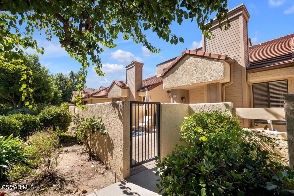 Welcome Home! This stunning three bedroom two-and-a-half-bathroom gem is the home you have been waiting for! Situated in the tranquil Summer Place neighborhood in Simi Valley, you are first greeted by a private front patio perfect for grilling, entertaining, and spending the evenings relaxing. Through the front door you have a totally remodeled living room with upgraded hardwood flooring, a striking stone fireplace, a beautiful chandelier, vaulted ceilings, crown moldings, and recessed lighting. Next to the living room is a perfectly sized dining room which opens to the nicely upgraded kitchen with granite-like counters, stainless steel appliances, and plenty of storage room for all of your cooking desires. Next to the kitchen is a family room which opens to the center atrium, bringing in wonderful nature light and perfect atmosphere. Upstairs there are three immaculate bedrooms, each with their own ceiling fan and light. The master suite has dual closets and a totally remodeled bathroom with marble tile floors, a beautiful dual sink vanity, new light fixtures and mirrors. Not to be forgotten is the large two car garage perfect for all automobile and storage needs. The modestly priced HOA covers all exterior maintenance as well as upkeep of the community area, and access to multiple community pools/spas. Run don't walk! This one won't last!