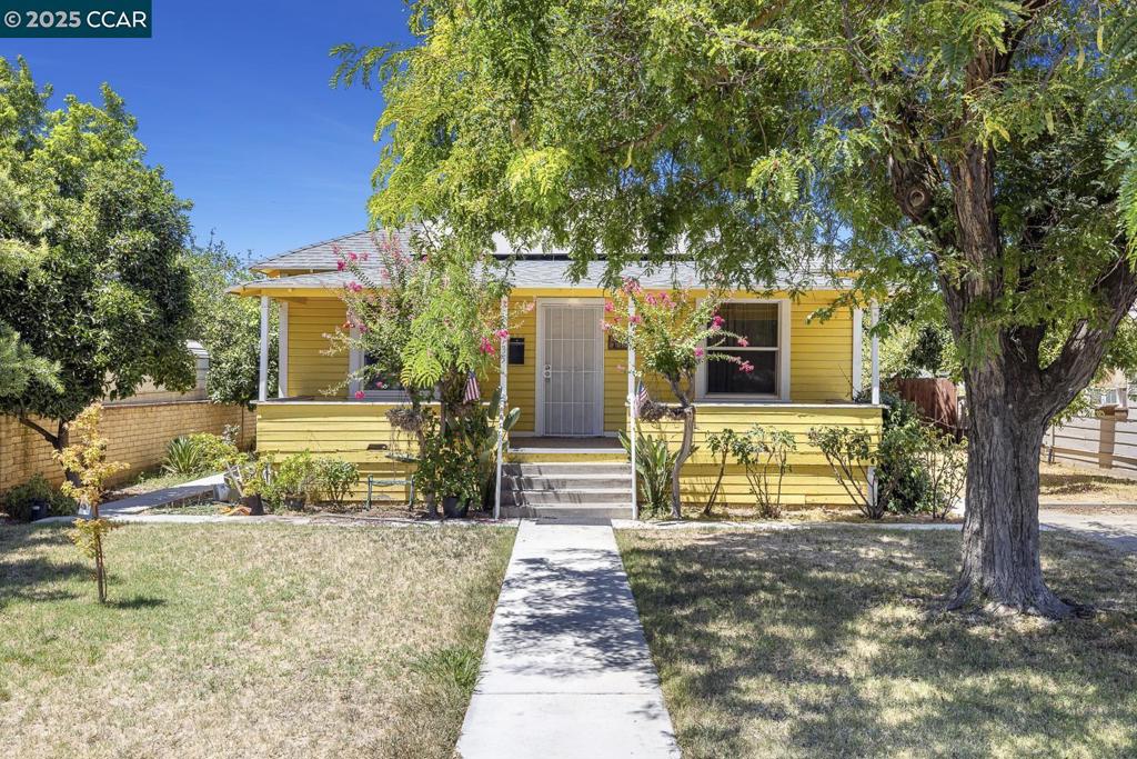 Great Location & Huge Lot! Trust Sale! Excellent Floor Plan, 2 Bedroom 1 Bathroom, Newer AC & Furnace, Newer Roof, Solar Panels, Huge Expansive Porch, Large Living Room and Dining Room, with custom built-ins, updated bathroom, laundry room, Large spacious kitchen looks out onto huge back yard, rear of yard accessed by Alley, great for Extra Parking, Vehicles, RV Access and more...large basement, Centrally located near all amenities, Ready for personal touches and more! Sold in AS-IS condition